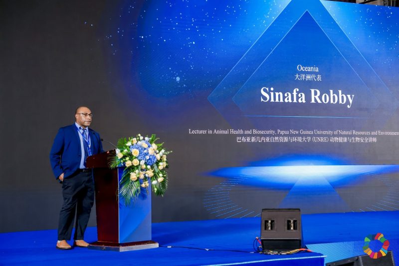 Sinafa Robby, Lecturer in Animal Health and Biosecurity, Papua New Guinea UNRE, delivered a speech.